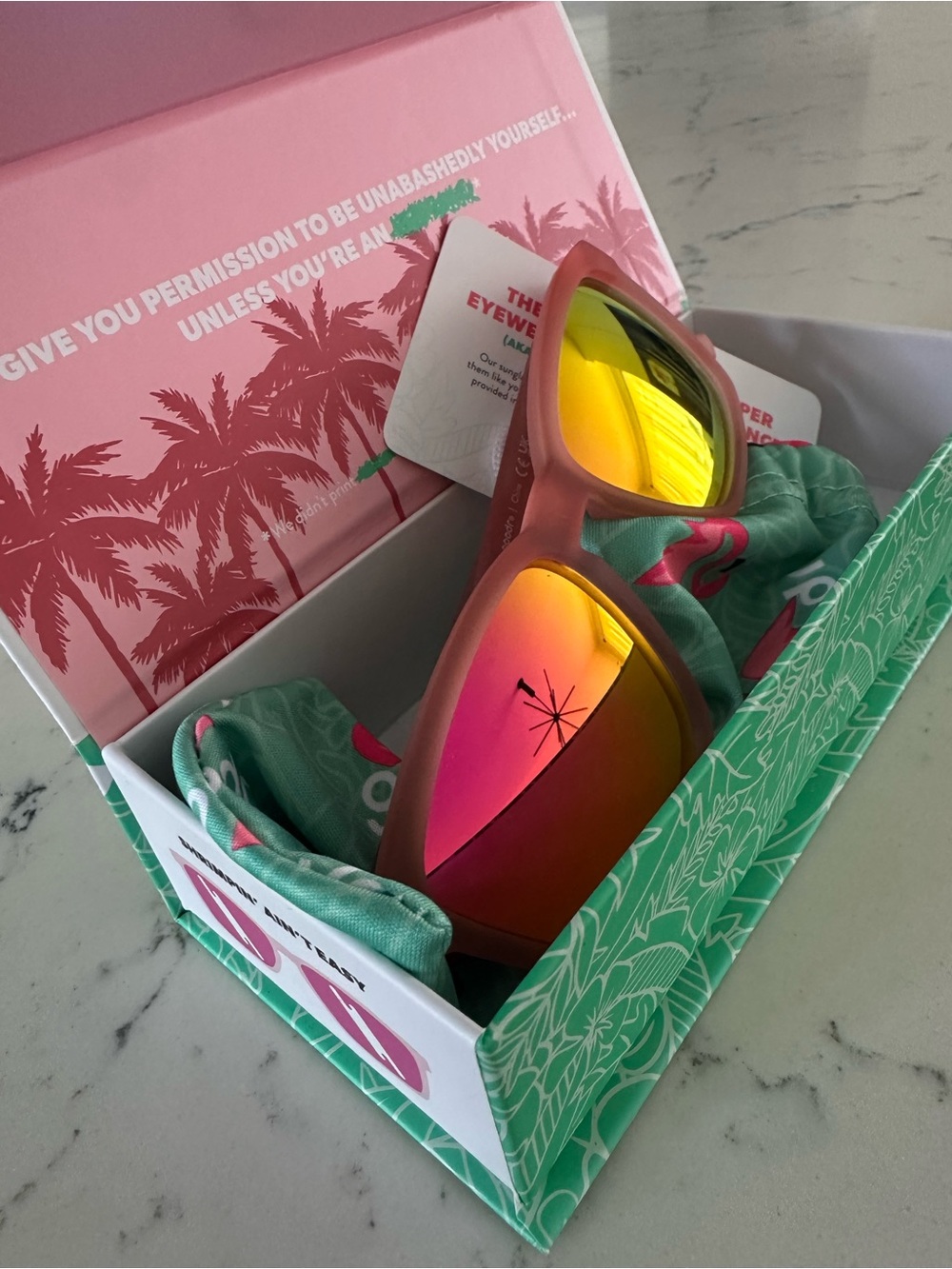 Goodr Pink Frame Sunglasses with Mirrored Yellow-Pink Lenses